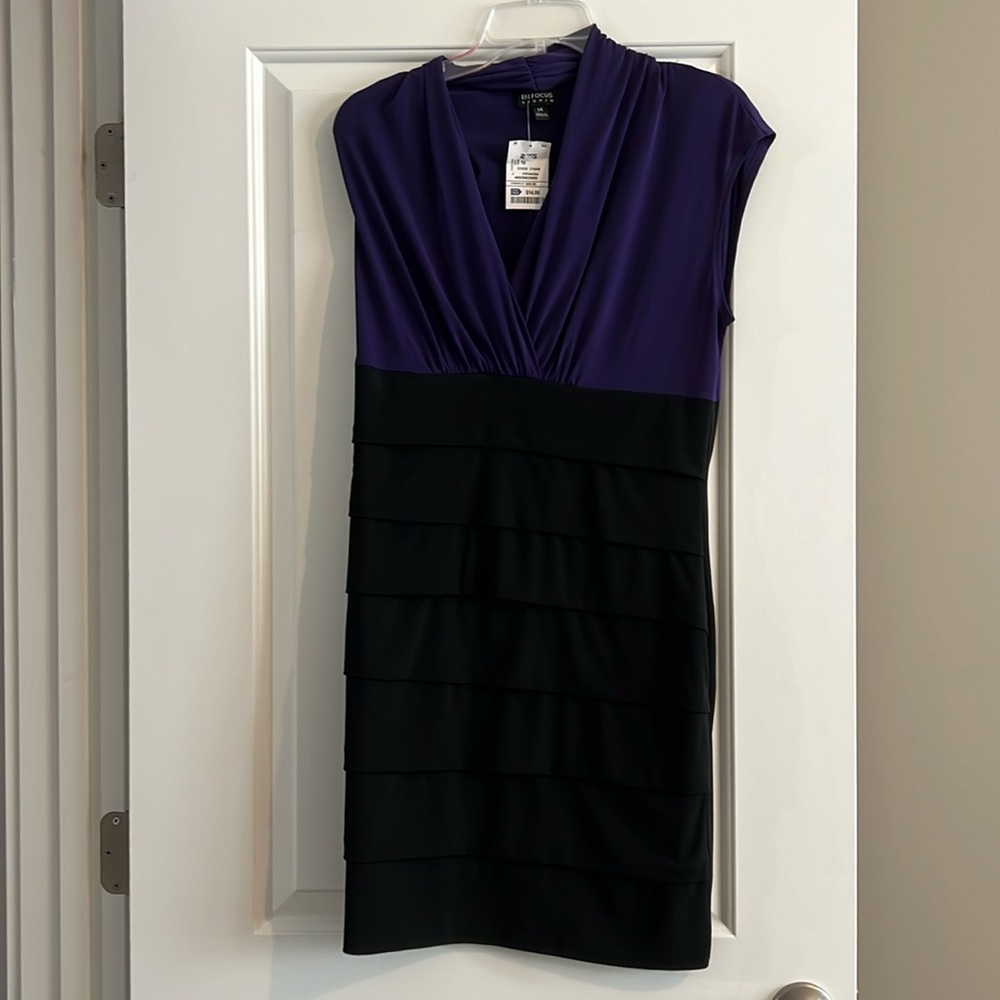 Never worn, brand new. Purple and black party dress